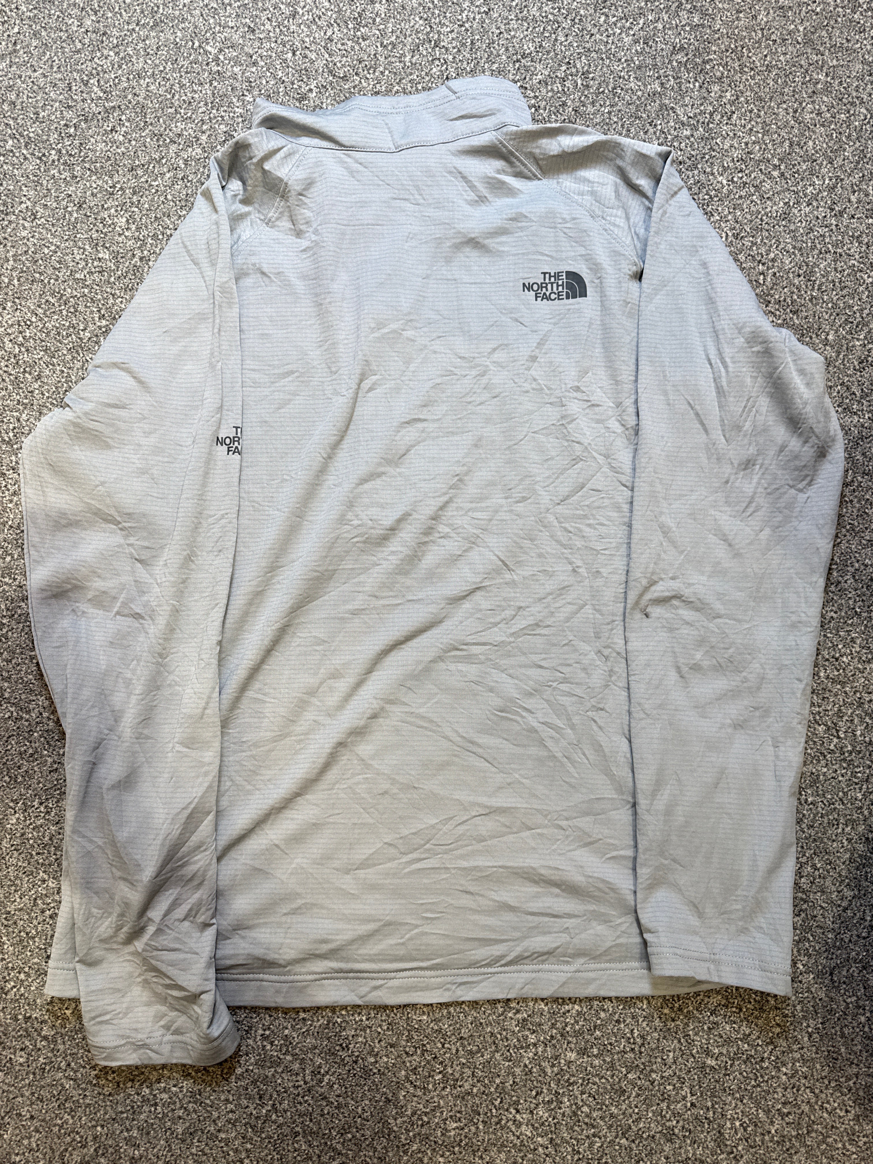 The North Face Men’s Half Zip Nylon Pullover with Fleece Interior – P540
