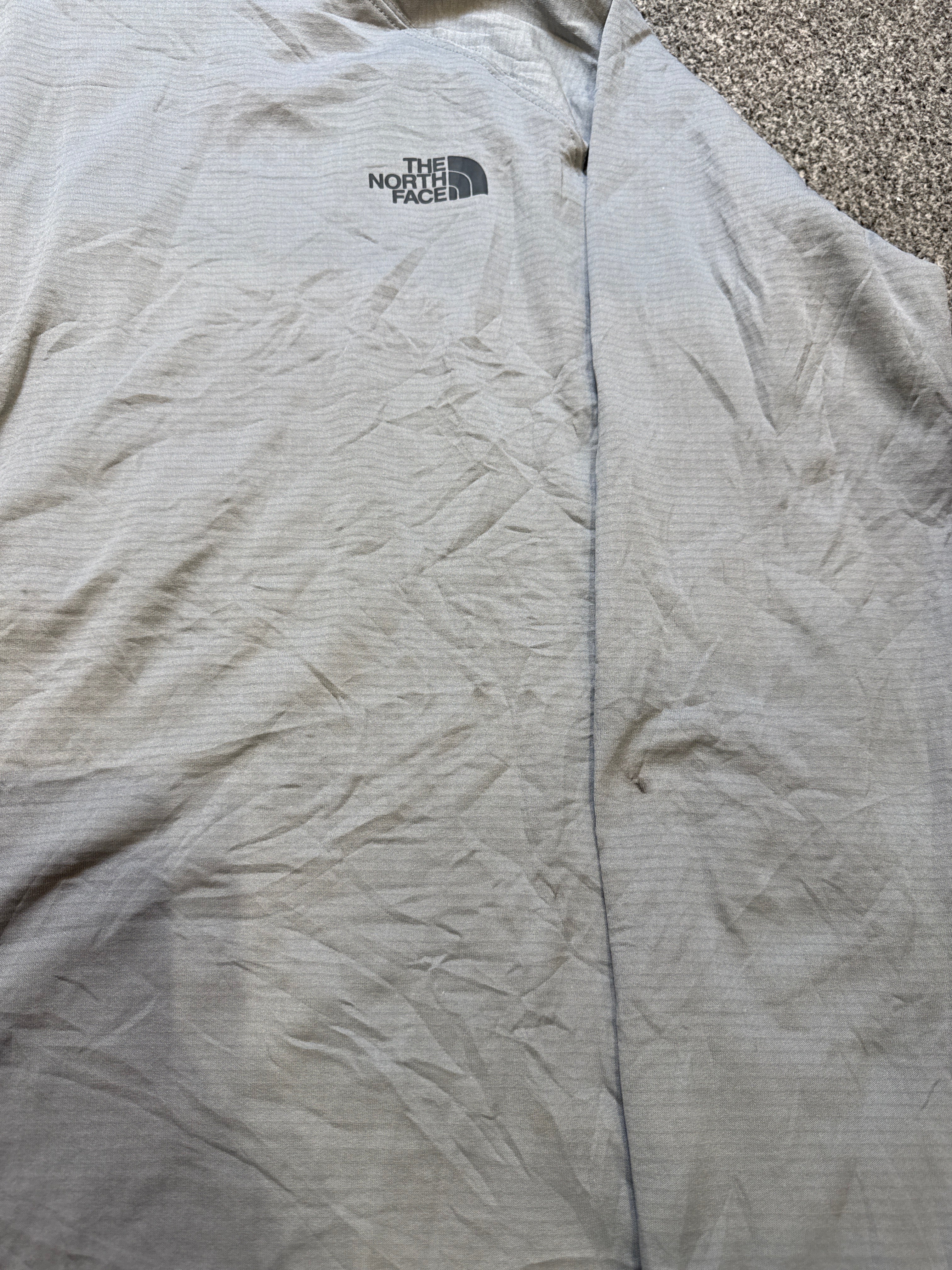 The North Face Men’s Half Zip Nylon Pullover with Fleece Interior – P540