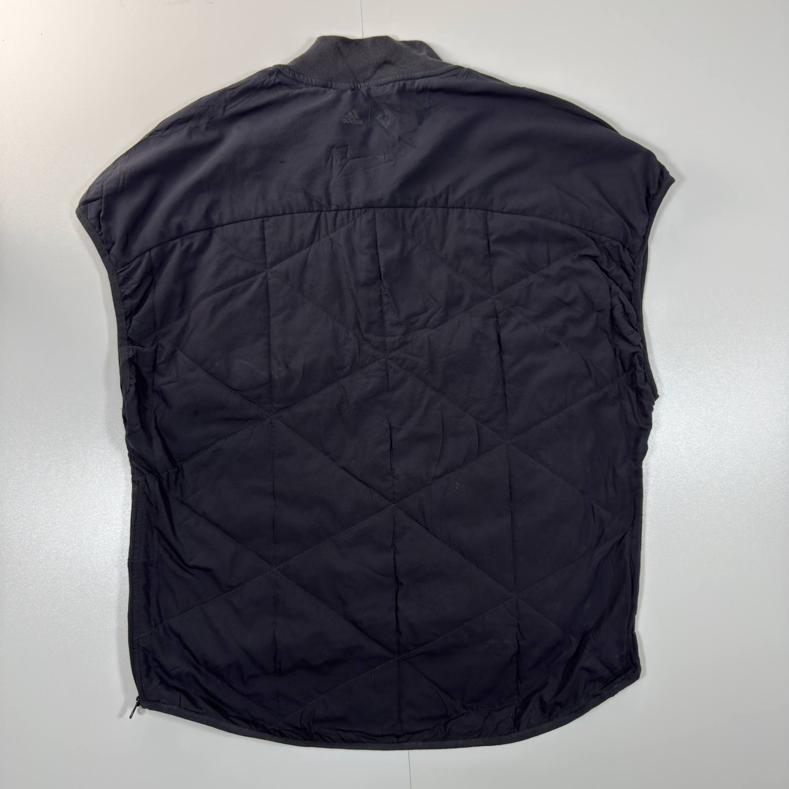 Adidas black quilted sleeveless vest with half zip