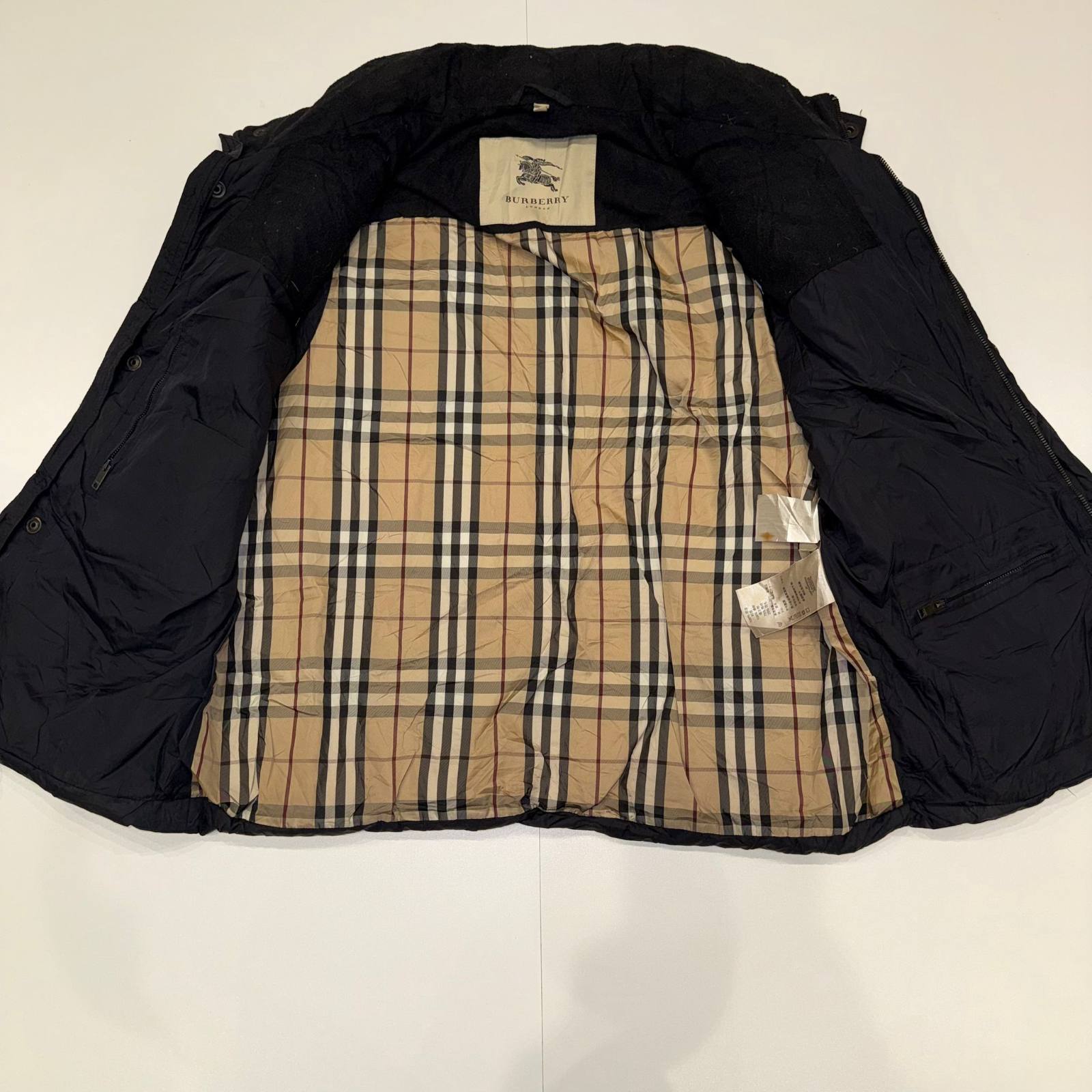 Burberry black padded vest with fleece collar