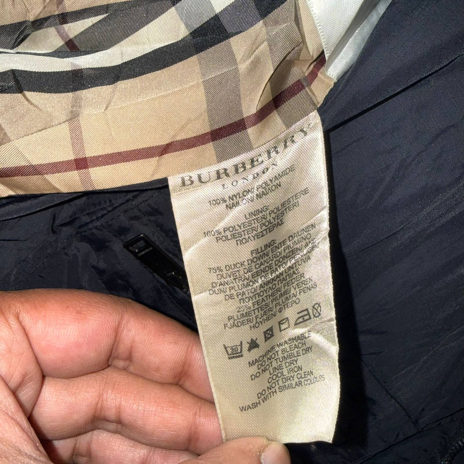 Burberry black padded vest with fleece collar