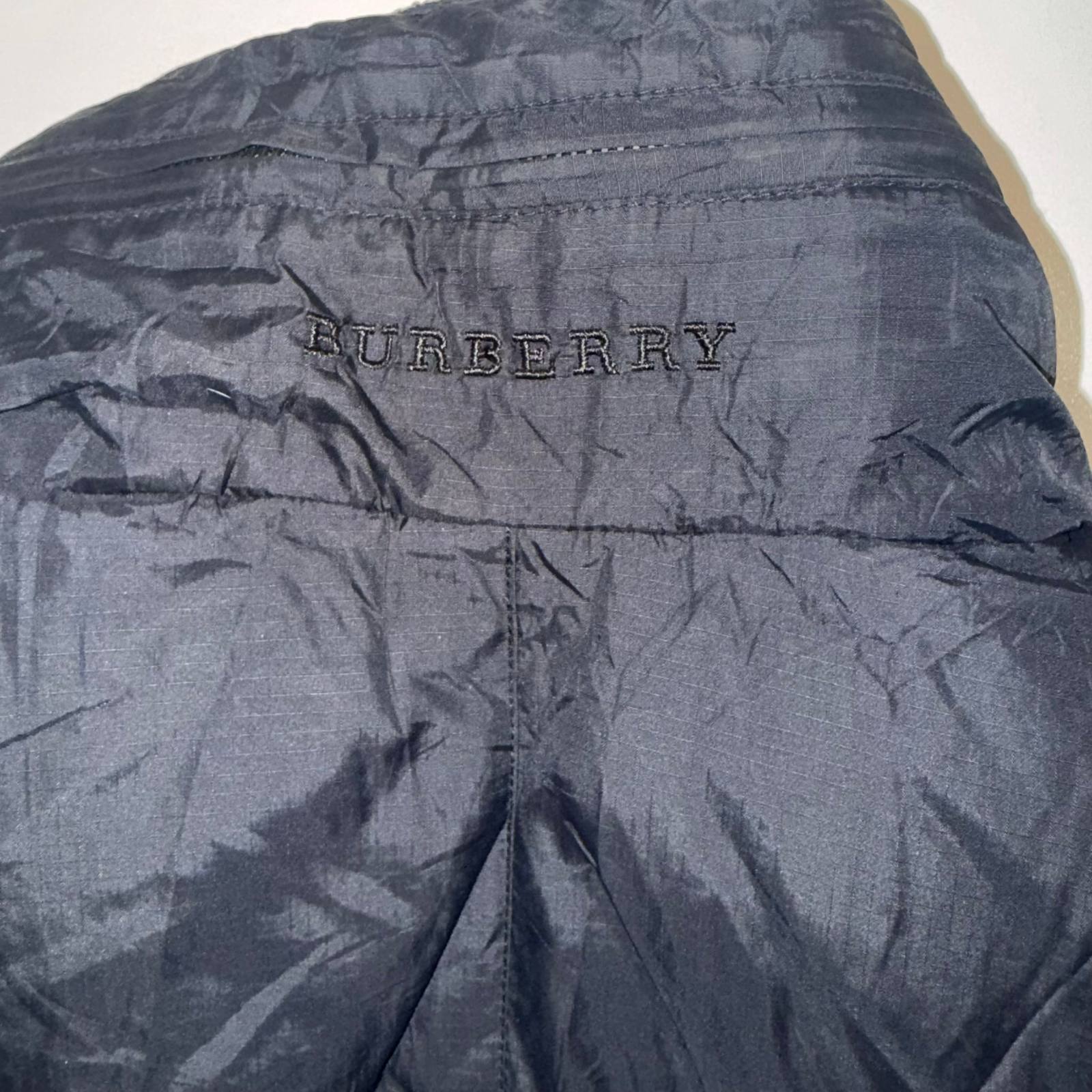 Burberry black padded vest with fleece collar